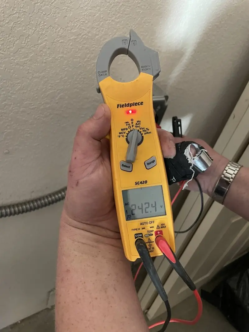 Voltage testing with clamp meter during Aluminum Wiring Replacement in Fairfield